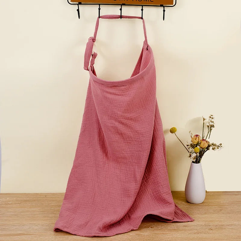 Nursing cover used as a light swaddle blanket